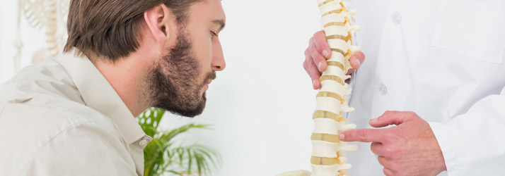 Chiropractic Castle Rock CO Back Pain Man With Doctor Chiropractic Castle Rock CO Back Pain Man With Doctor